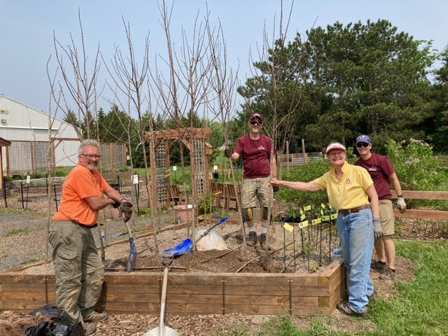 Volunteers planted more than two dozen seedlings in the new gravel bed tree nursery.