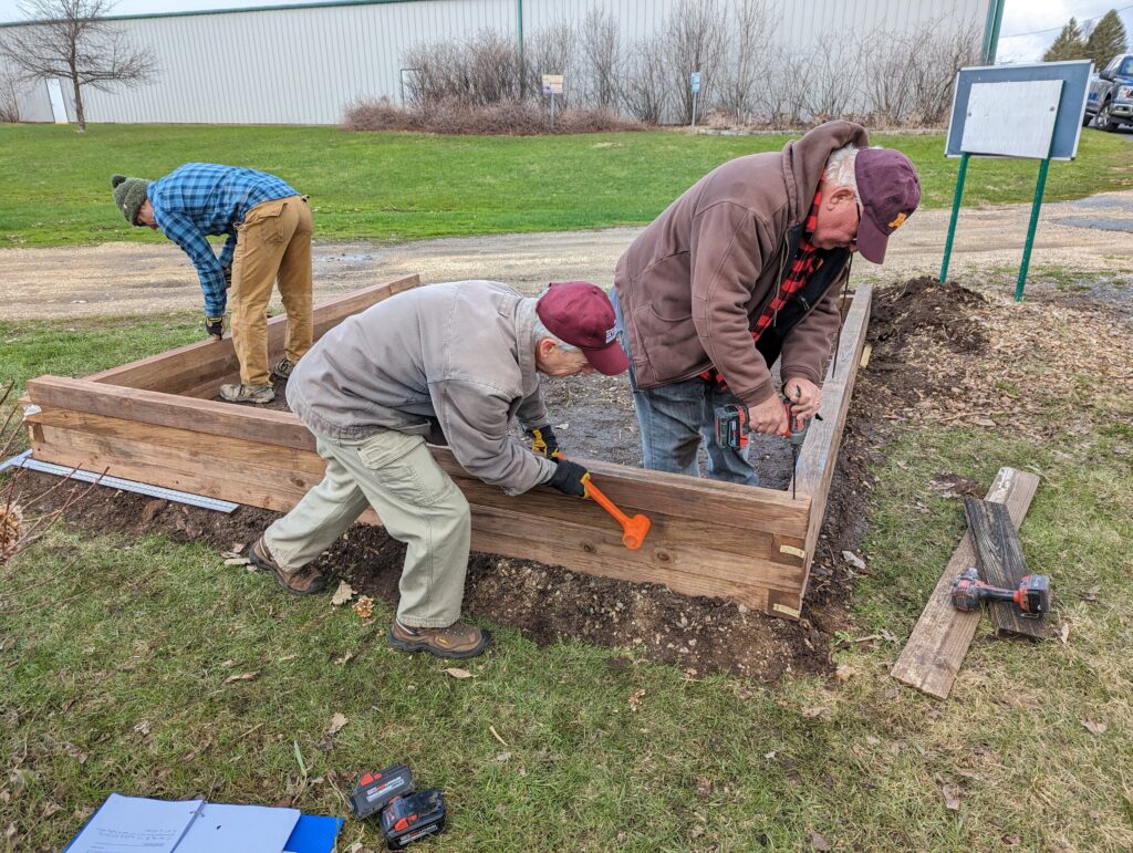 Building the frame for the gravel bed tree nursery at the Washington County Fairgrounds.