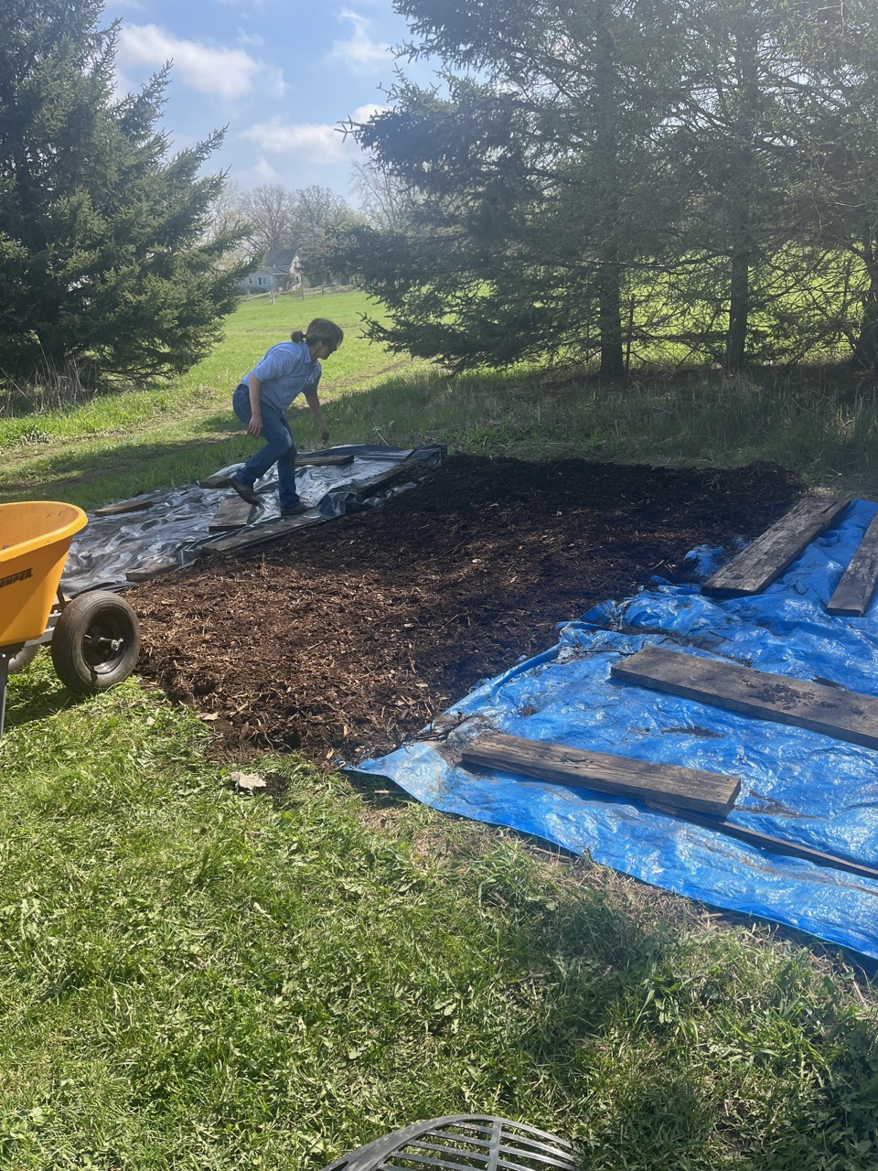 prepping garden soil at the Fairest Gardens in the Washington county fairgrounds in stillwater, mn